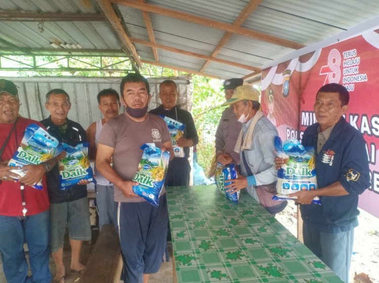 Polsek Sei Beduk Gelar Minggu Kasih dan Bansos di Simpang Bagan