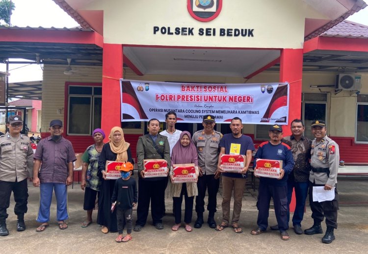 Polsek Sei Beduk Sumbangkan 62 Paket Bansos dalam Bakti Sosial Polri Prresisi