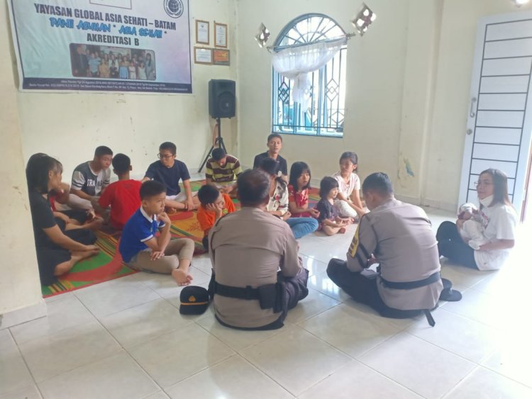 Kegiatan Minggu Kasih dan Bantuan Sosial (Bansos) Polsek Sungai Beduk Polresta Barelang untuk Masyarakat Kav. Lama Sungai Daun Kel. Tanjung Piayu