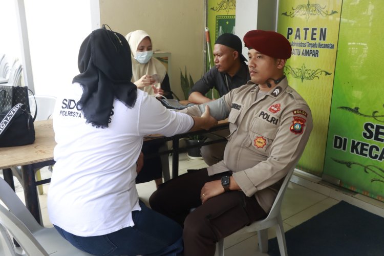 Dokkes Polresta Barelang laksanakan  Pemeriksaan Kesehatan Personel yang melaksanakan tugas  Pengamanan di Gudang PPK Wilayah Hukum Polresta Barelang