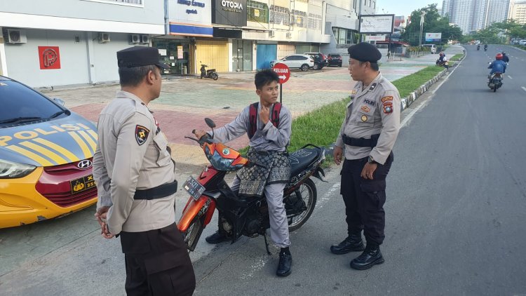 Kegiatan pengaturan Jalan Strong poin pagi   di wilayah Polsek Lubuk Baja kota Batam