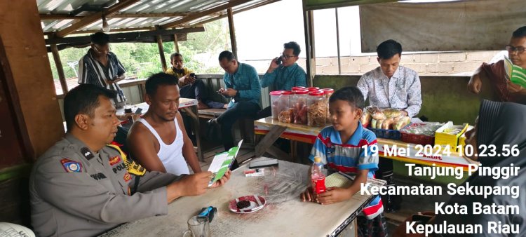 Bhabinkamtibmas Tanjung Pinggir himbau warga yang sedang nongkrong