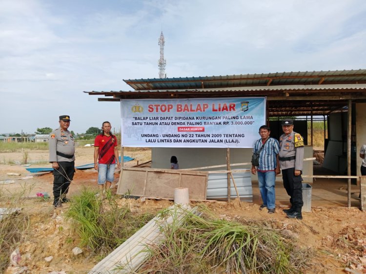 Kapolsek Sagulung Pasang Spanduk Himbauan Stop Balap Liar